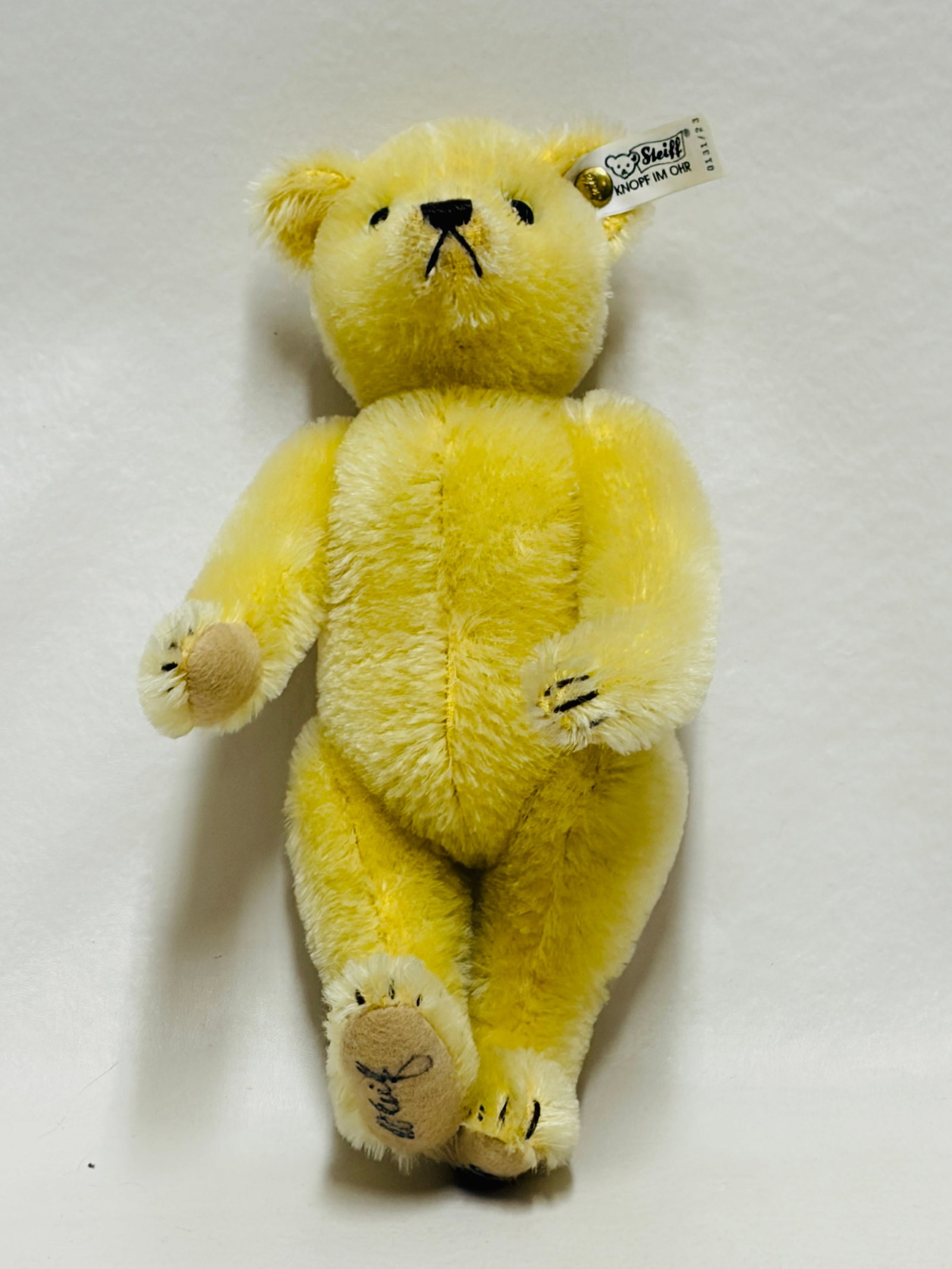 Signed Steiff Lemon Yellow Mohair Teddy Bear: Signed Steiff Lemon Yellow Mohair Teddy Bear ------------------ please review all pictures carefully because they are part of the description and show condition issues if any ------------------
