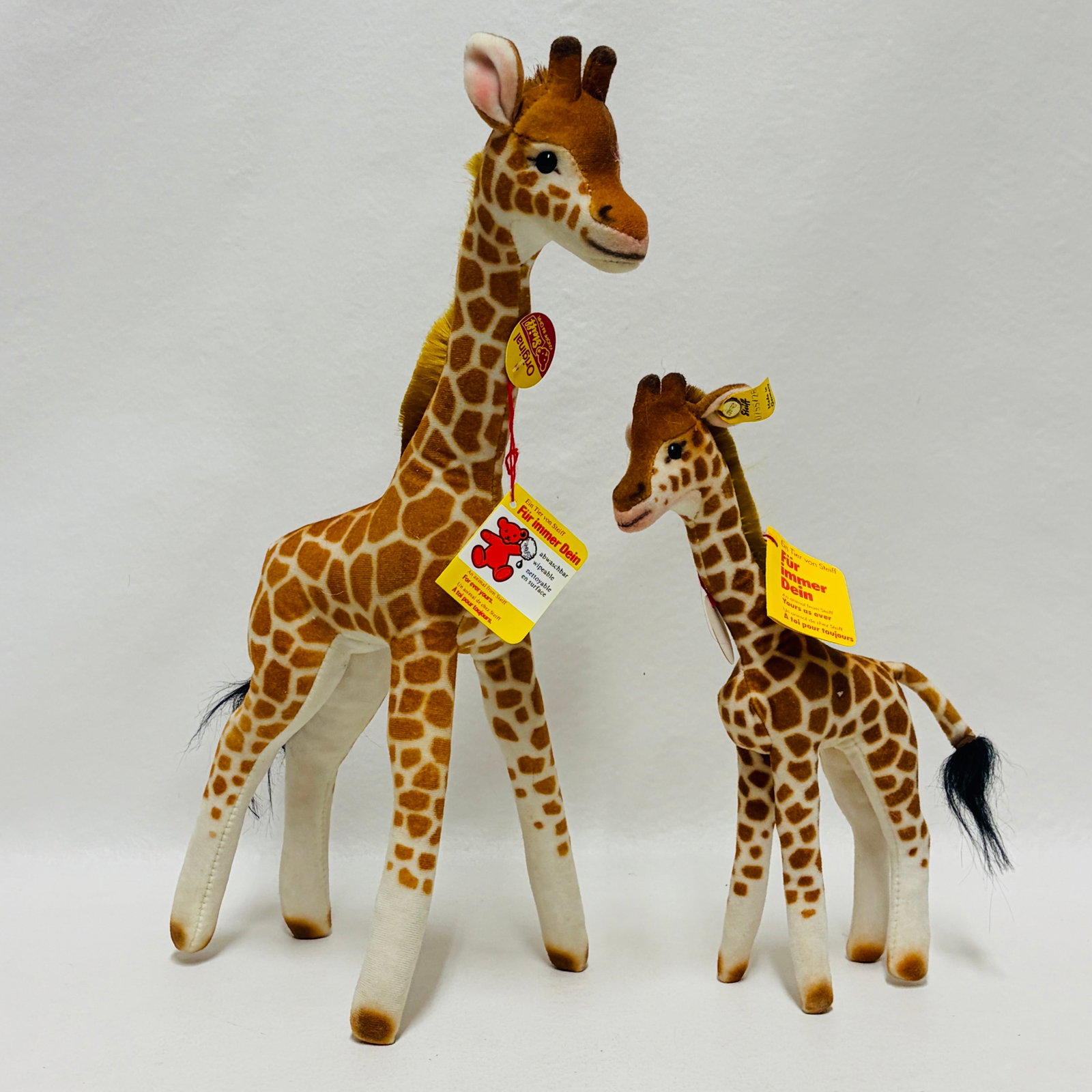 Two Steiff Giraffes: Two Steiff Giraffes ------------------ please review all pictures carefully because they are part of the description and show condition issues if any ------------------ please consider the shipping