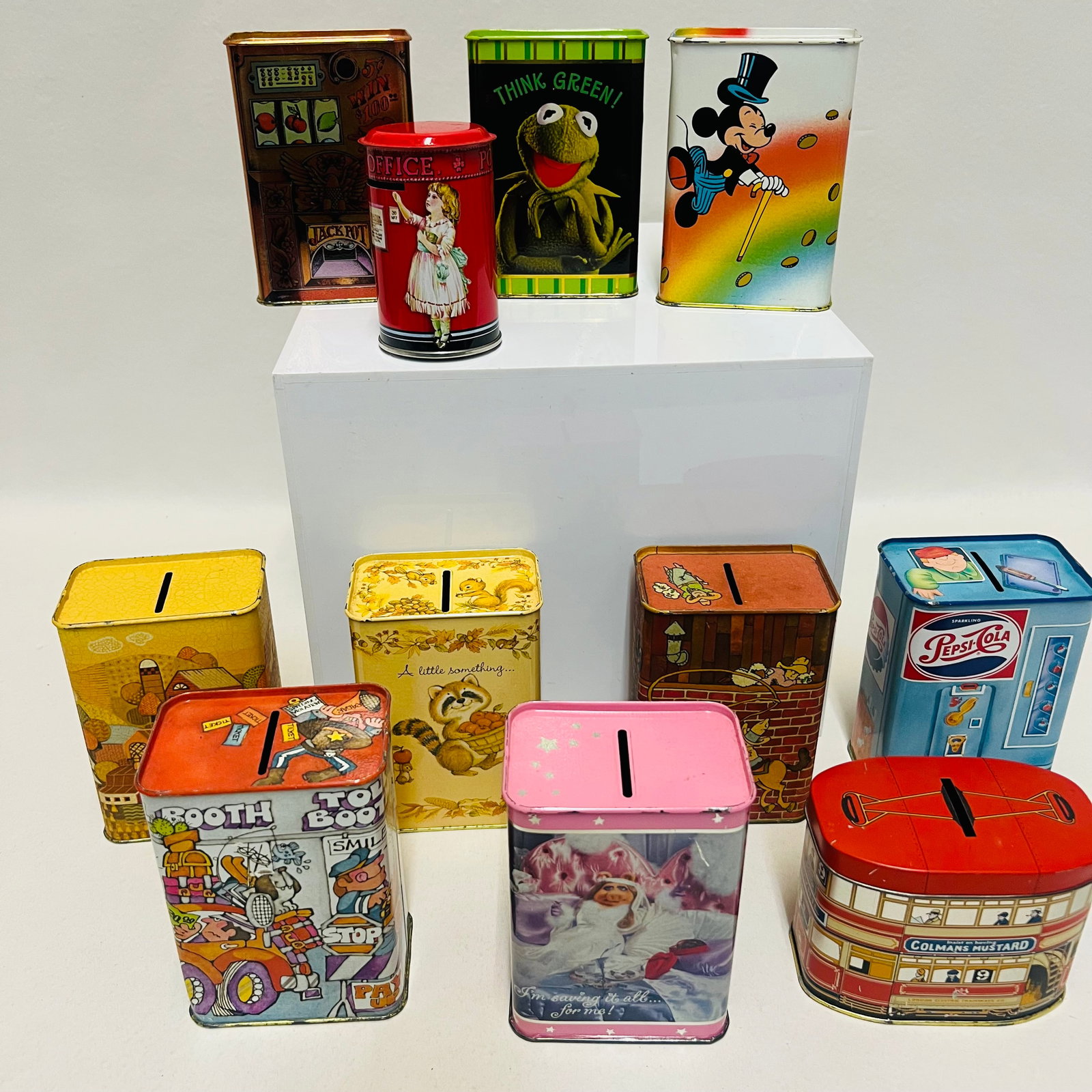 Collection of Vintage 1970s, 1980s Tin Advertising and Character Banks: Vintage Tin Coin Bank Lot, Hallmark, Muppets, Mickey, Pepsi, Colmans Mustard Post