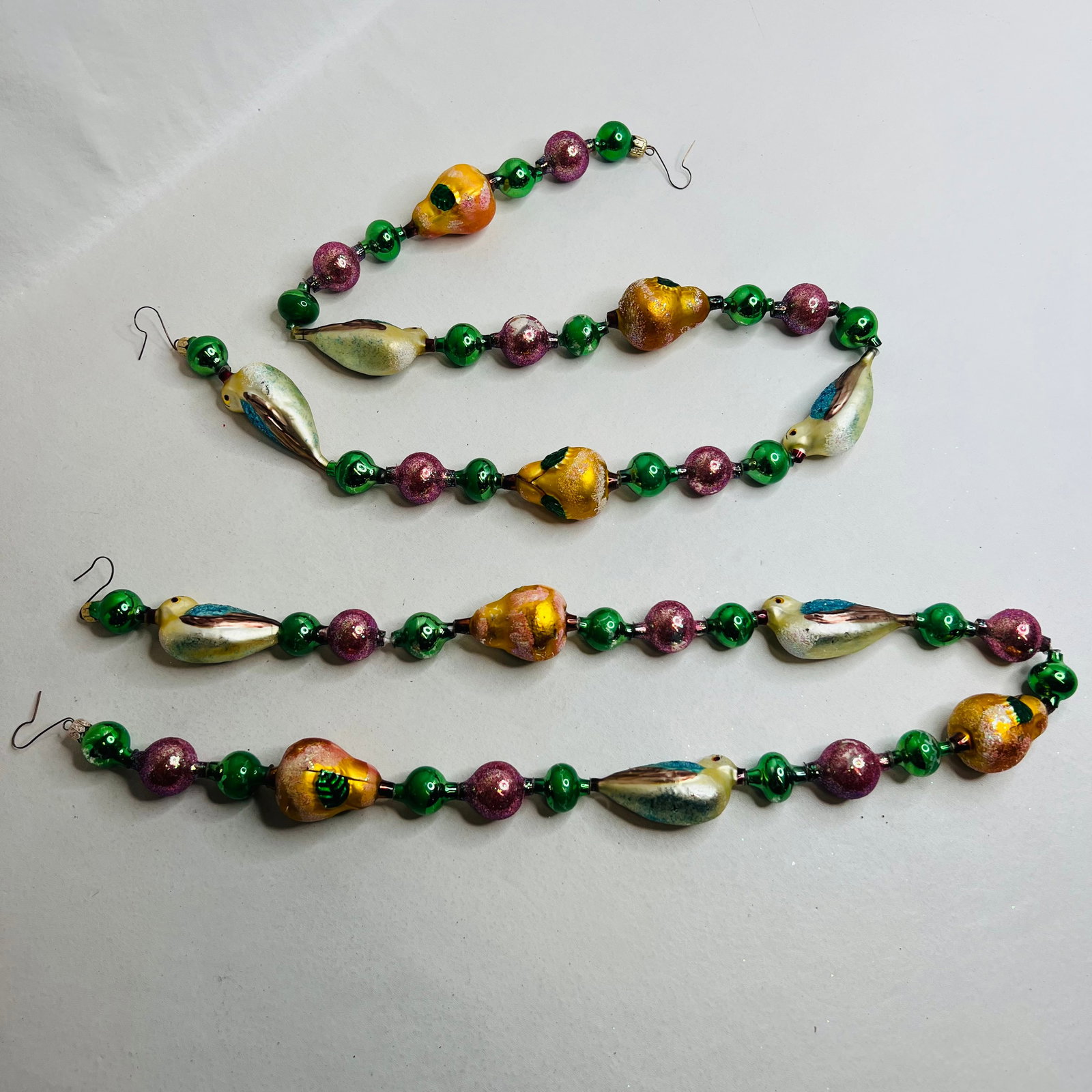Two Vintage Blown Glass Bird & Fruit Christmas Garlands: Two Vintage Blown Glass Bird & Fruit Christmas Garlands, each one measures approx. 36 inches