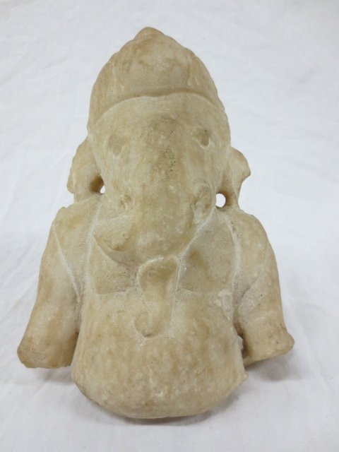 Ancient carved limestone fragment of the Indian God: Ancient carved limestone fragment of the Indian God Genesha