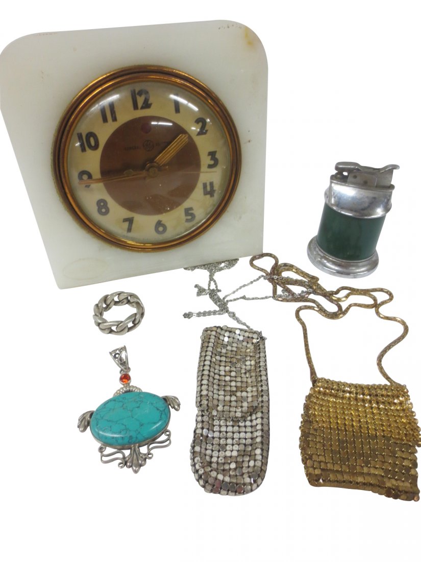 General Electric Clock, Metallic mesh Purses, lighters: General Electric Clock, Metallic mesh Purses, lighters and misc. costume jewelry