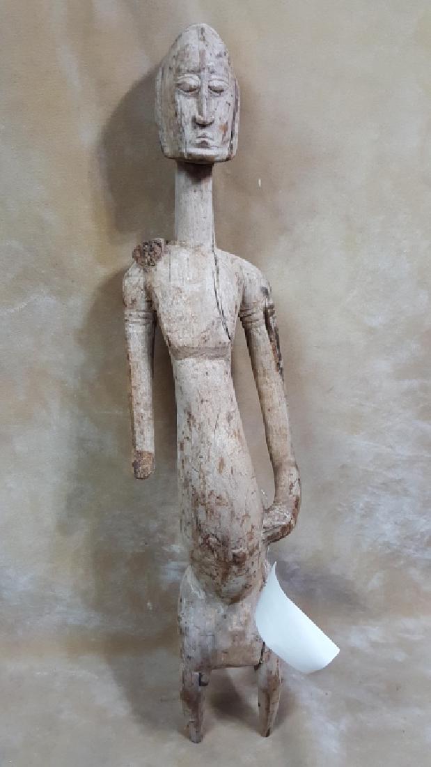 Carved Wood African Fertility / Pregnant Figure: Early African artifact,from New York City estate. Female figure, showing a pregnant belly. With some losses. 38".