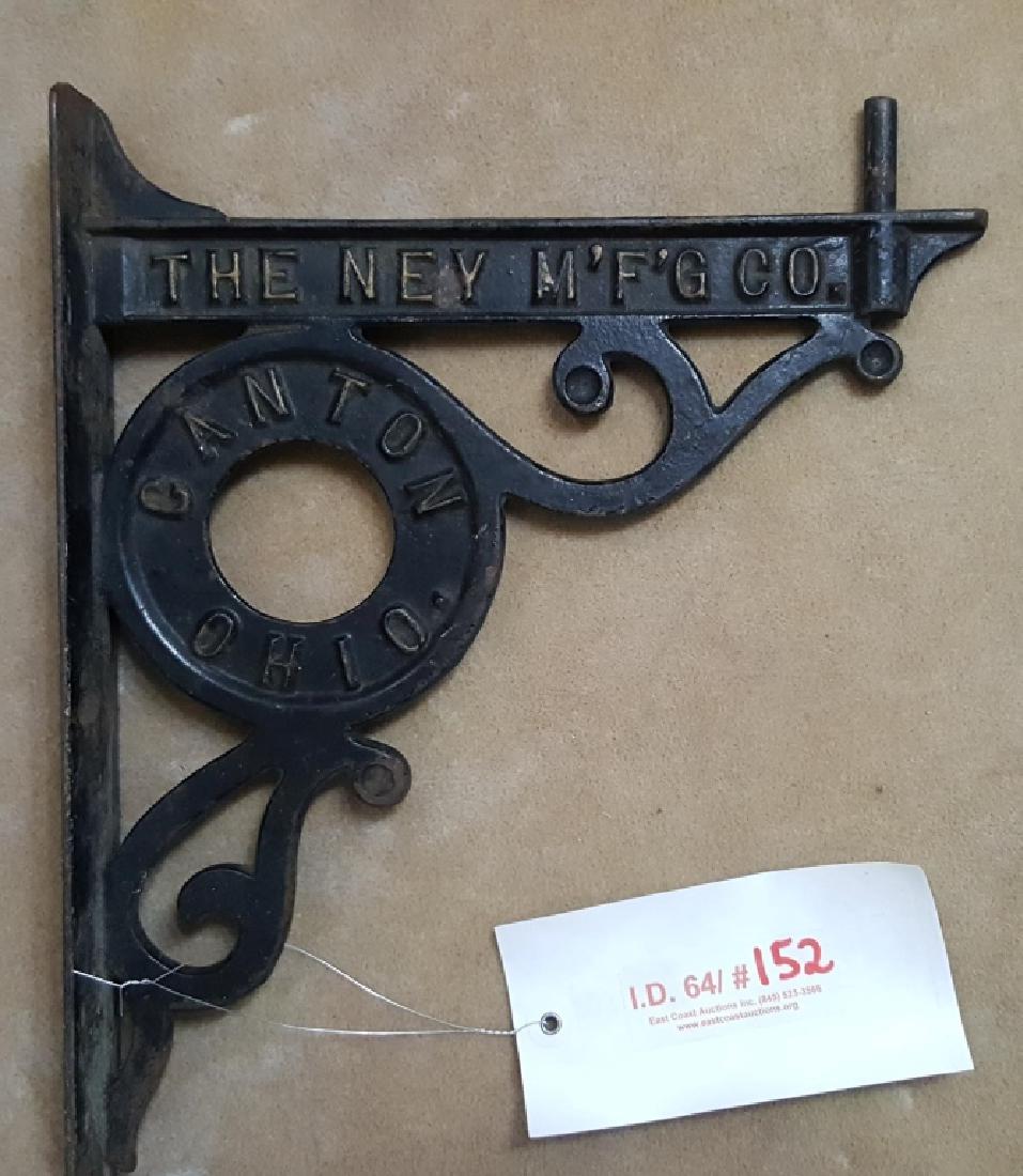 The Ney Mfg Co / Canton Ohio; Cast Iron Wall Mount: Cast iron right angle wall mount. 10.75" X 13.75"