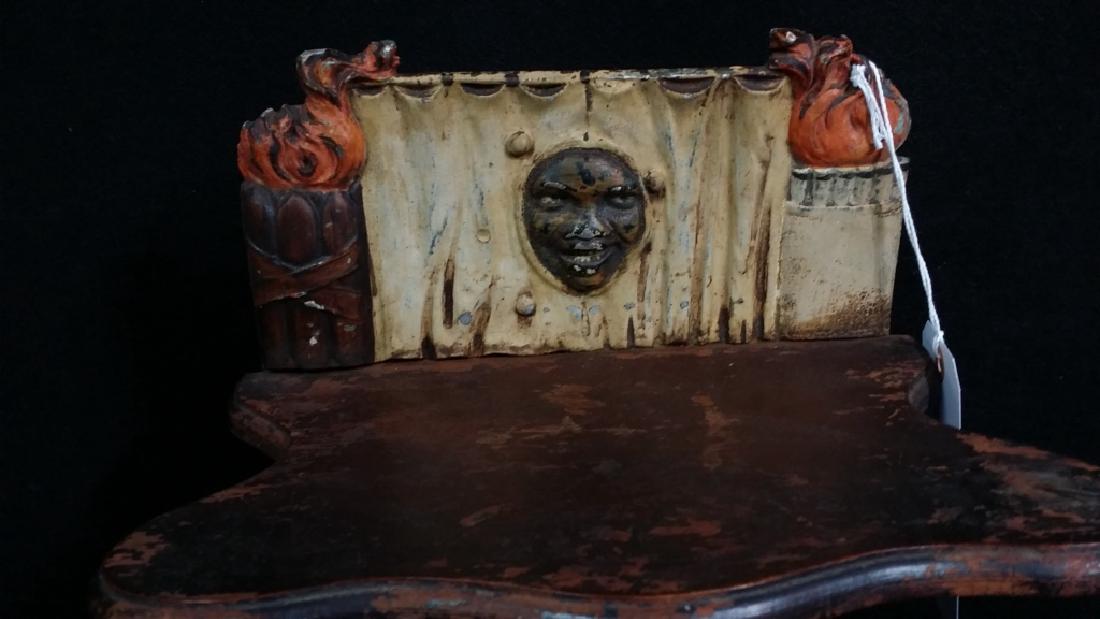 Claw Footed Black Americana Smokers Stand: Iron claw foot base standing 32.75". Cast iron painted top, with back black face behind curtains and cigars / cigarettes burning on either side.