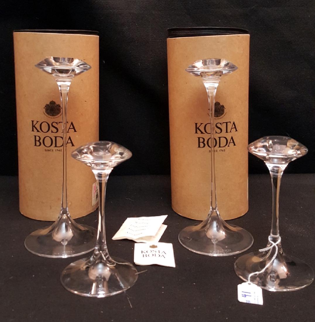 Signed Kjell Engman Kosta Boda Candle Sticks: The larger pair are Kjell Engman. They are signed and numbered. 10 7/8" (each having the original box. Along with a smaller pair standing just over 7"