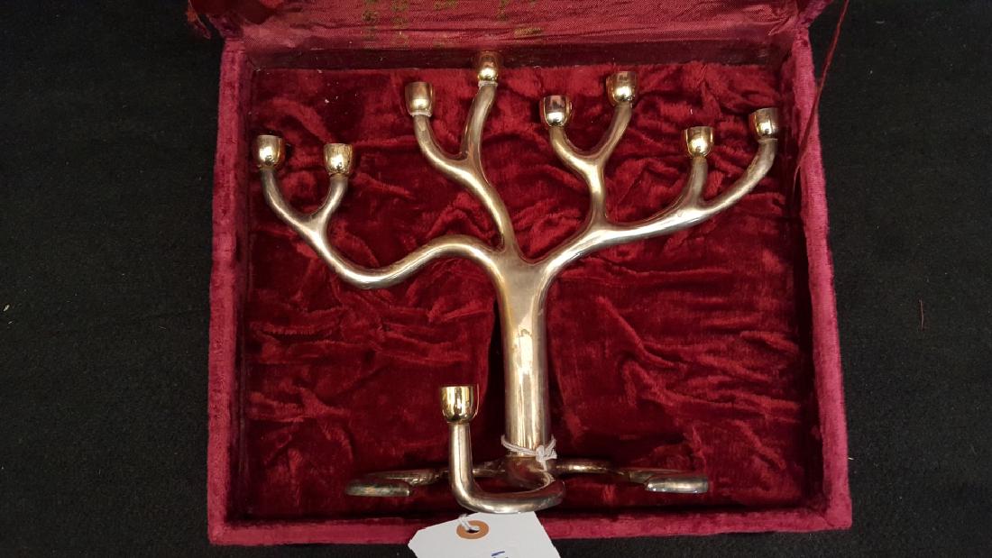 Silver Plated Rosenthal Menorah by Sandra Kravitz: Designed by Sandra Kravitz for The Rosenthal Collection. Standing 8.75" with original box.