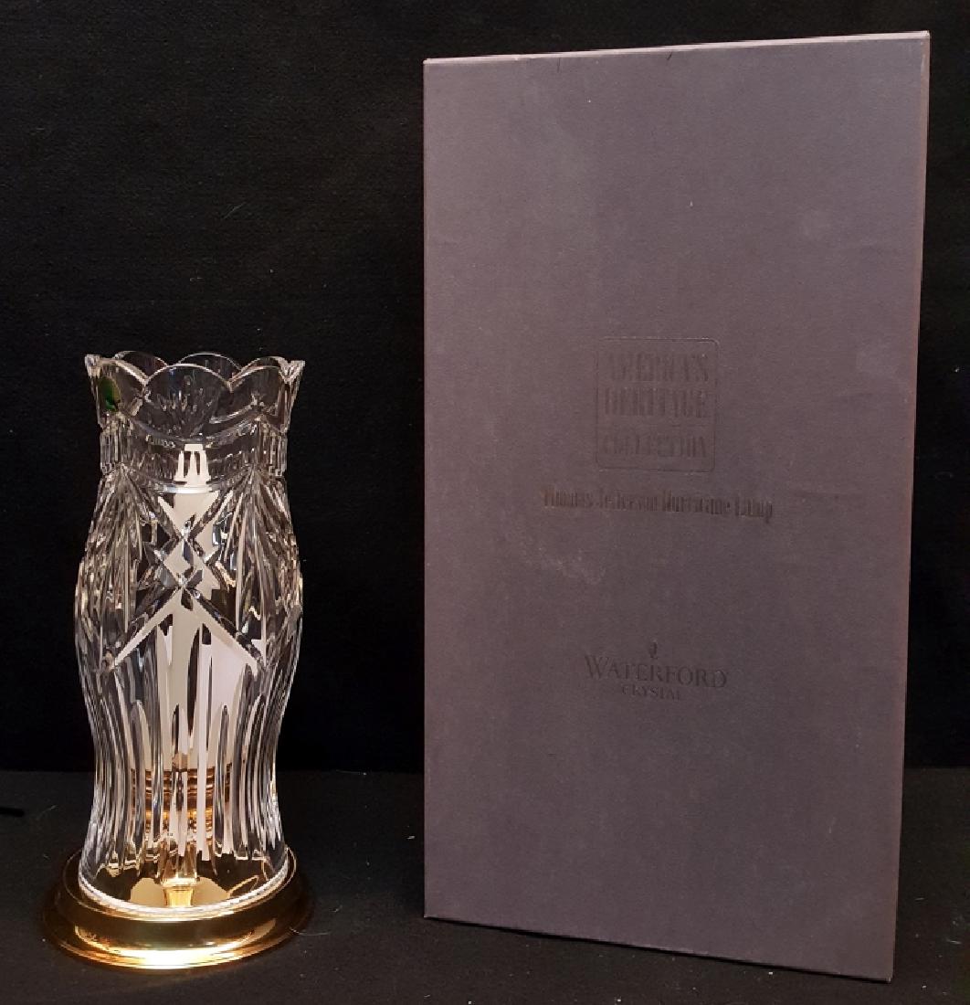 Waterford Thomas Jefferson Hurricane Lamp: An as new "America's Heritage Thomas Jefferson Hurricane Lamp". Glass portion 11" tall. Box with some slight storage wear.