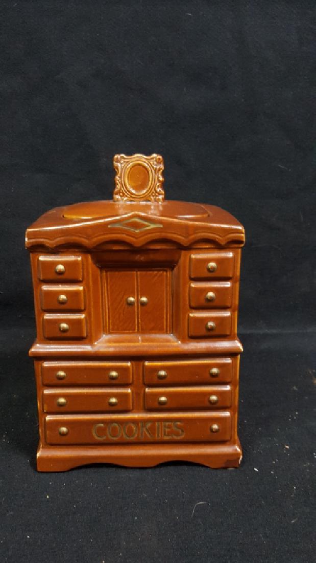 Chiffonnier Brown Dresser McCoy USA Cookie Jar: McCoy USA on either corner on the lower back. Standing 11.5"