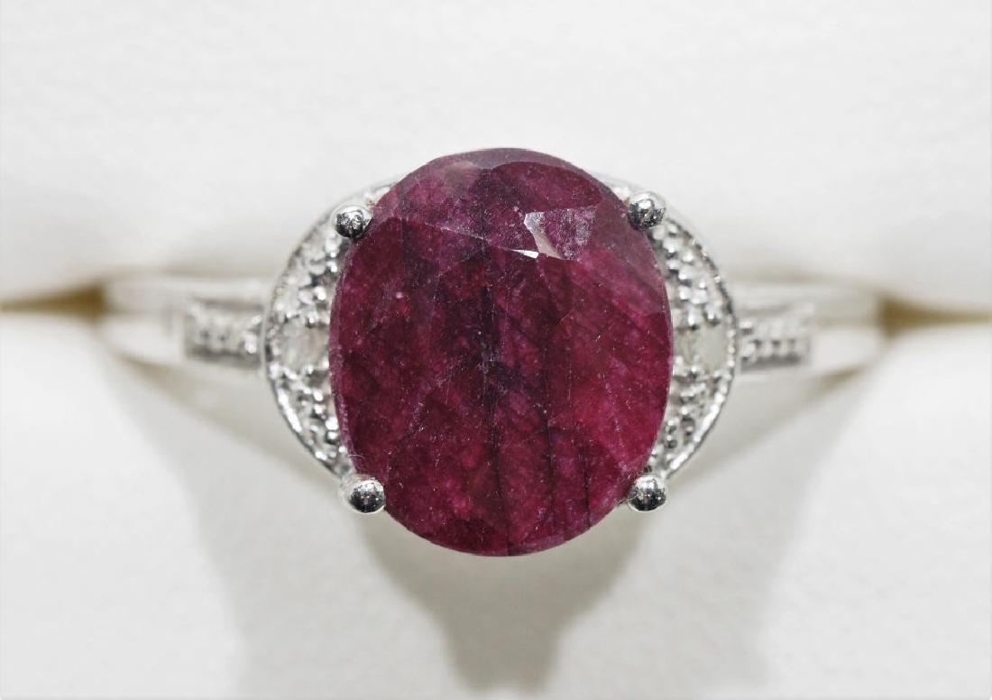 Sterling Silver Ruby & Diamond Ring: Sterling Silver Ruby (app. 3ct) with 2 Diamond Ring. Retail $300