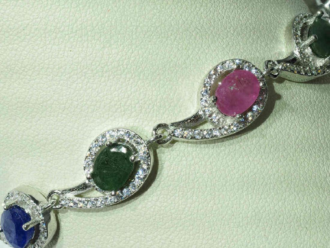 S.S. Genuine Ruby Sapphire Emerald & CZ Bracelet: Sterling Silver Genuine Ruby Sapphire Emerald CZ Bracelet. Retail $400