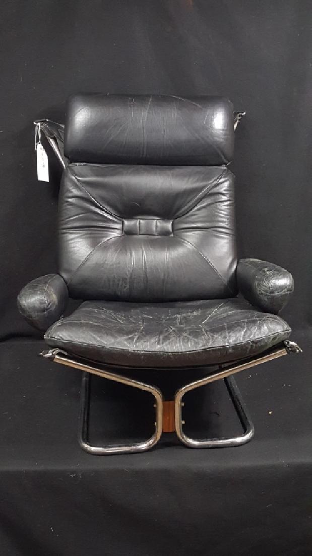 Vintage Mid Century "Siesta" Westnofa Sling Chair: The chair with chrome frame and rosewood inserts. With vintage Westnofa tag on back left sling. Leather worn, one hole on arm. Designed by Ingmar Relling. C. 1960's. No ottoman.
