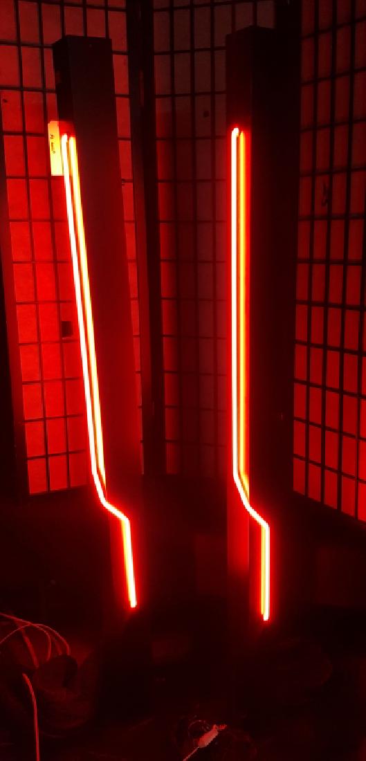 A Pair of Rudi Stern Neon Floor Lamps: Designed by Rudi Stern & Don Chelsea for George Kovacks. Both with working red neon tubes. 6' tall.