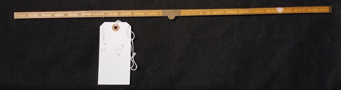 A Stanley No. 62 Folding Rule: Boxwod and brass rule. "Stanley Rule / & Level Co.", "Warranted / Boxwood", "New Britain, Conn. / USA".