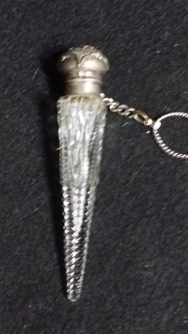 Antique Silver Cut Crystal Vinaigrette: Silver top with Cherub and floral surround, 4.25. No clear silver mark.
