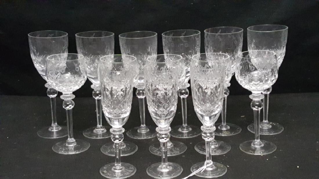 (14) Collection of Bohemian Cut Crystal Stemware: A collection wine glasses with different sizes and designs, as pictured.