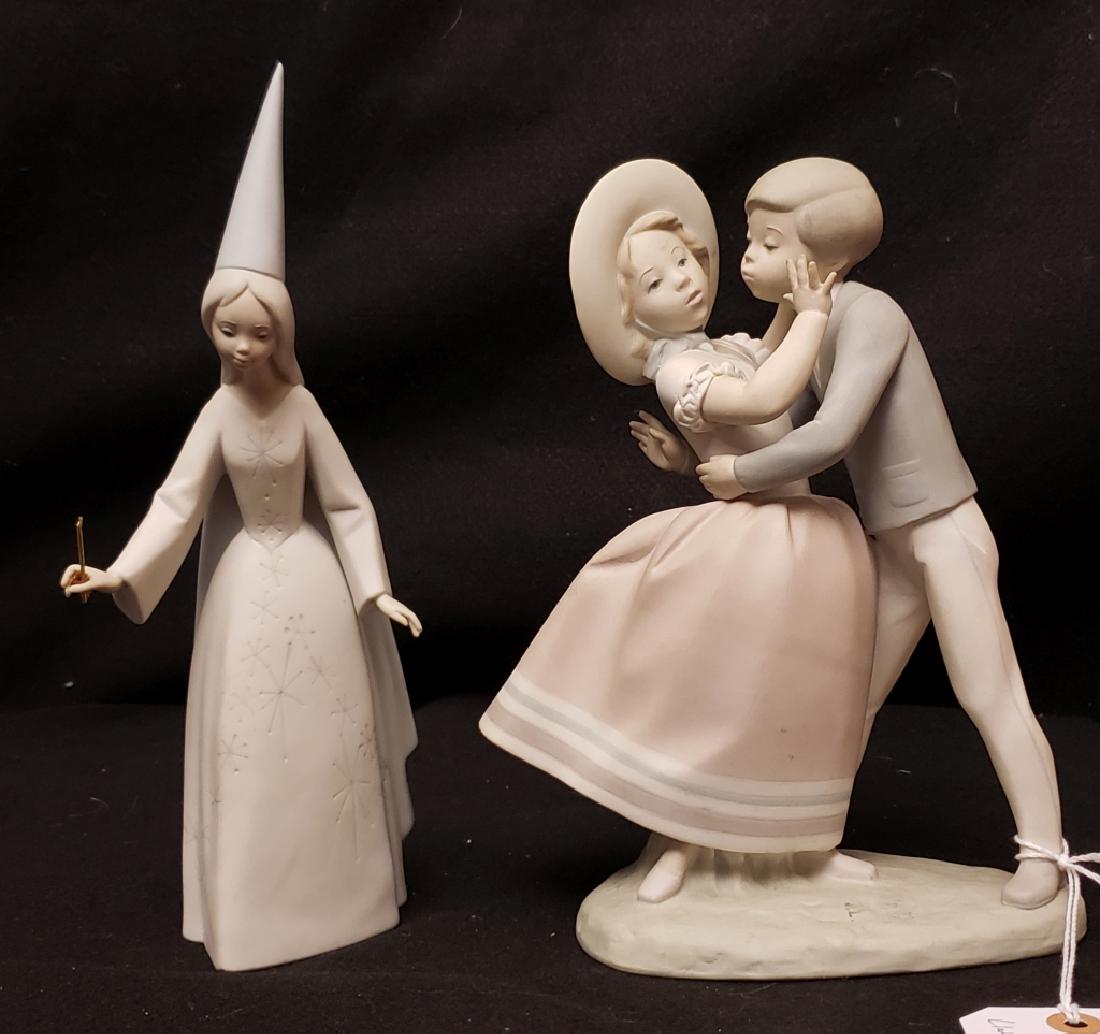 Lladro Boy Kissing Girl And Good Witch Figures: Another older Lladro Piece, "Stealing a Kiss". Standing 10". Along with the "Good Witch" Figurine 11"