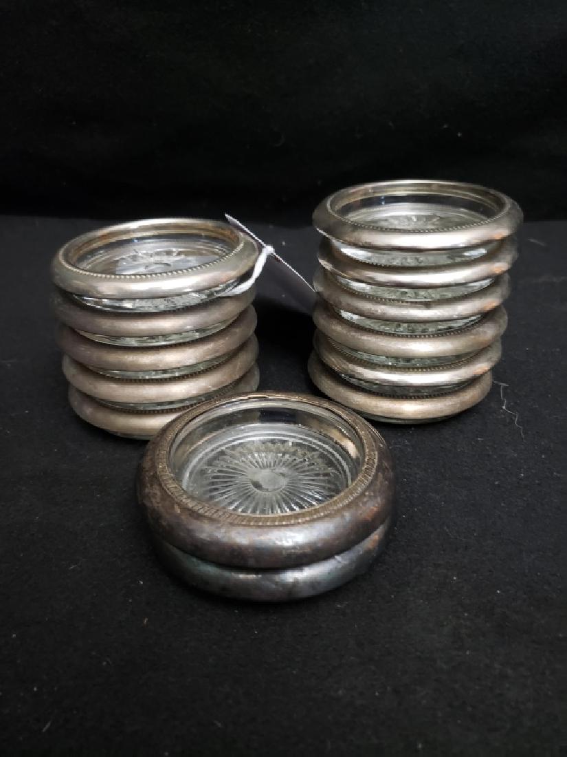 A Collection of Sterling Silver Rimmed Coasters (1 of 3)