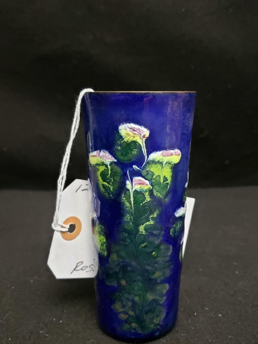 Rosel Bass Enamel Beaker: 5 5/8" tall enamel beaker. Signed on base "Rosel Bas/ Handpainted / Israel". Colorful floral decoration, no damage to enamel.