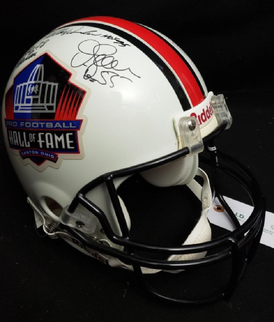 Pro Football Hall of Fame Multi-Signed Full Size H: A large size official Riddell Pro Football Hall of Fame / Canton, Ohio. This helmet comes with signatures from NFL football legends Jr Seau #55, Warren Moon #1, Curtis Martin #28, Kellen Winslow HOF '