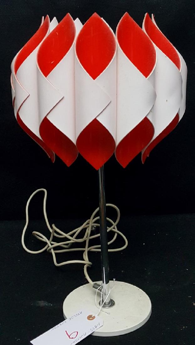 A Midcentry Modern Atelje Lyktan (Sweden) Lamp: The red & white swirl plastic shade on a heavy chromed pole and white plastic base. Metal tag at neck of lamp "Atelje Lyktan Ahus".