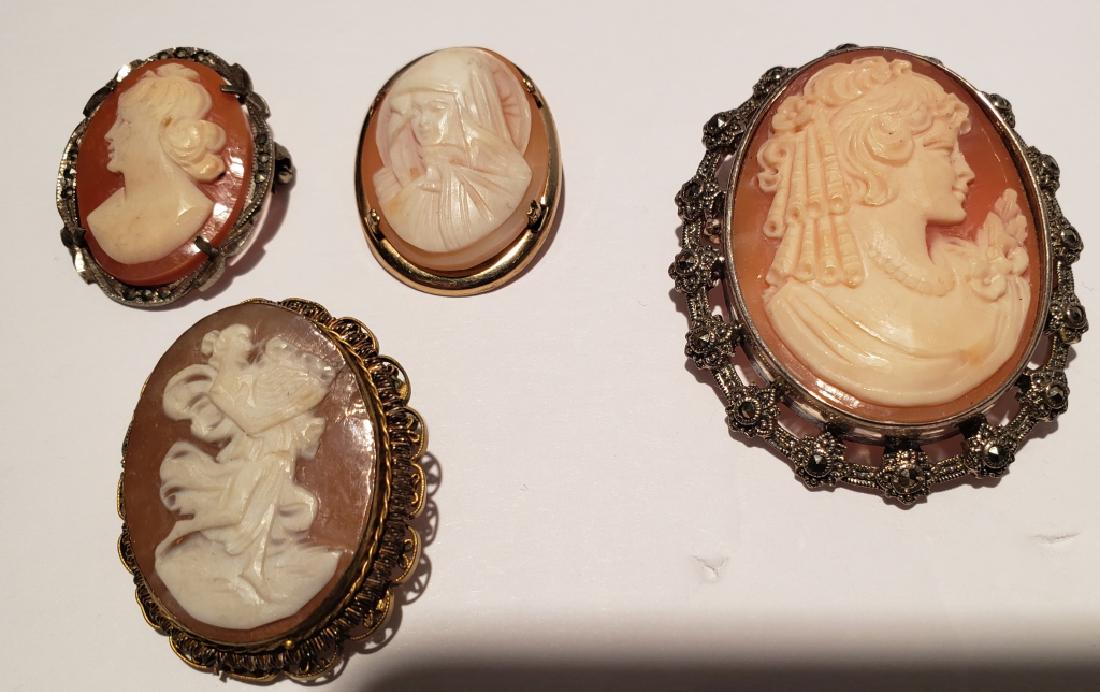 Vintage Cameo Lot- 4 Pcs: Marcasite framed cameo, cameo roughly 1", GF cameo, 1", dancing lady cameo, 1.25" tall, cameo in silver frame, 1 5/8".