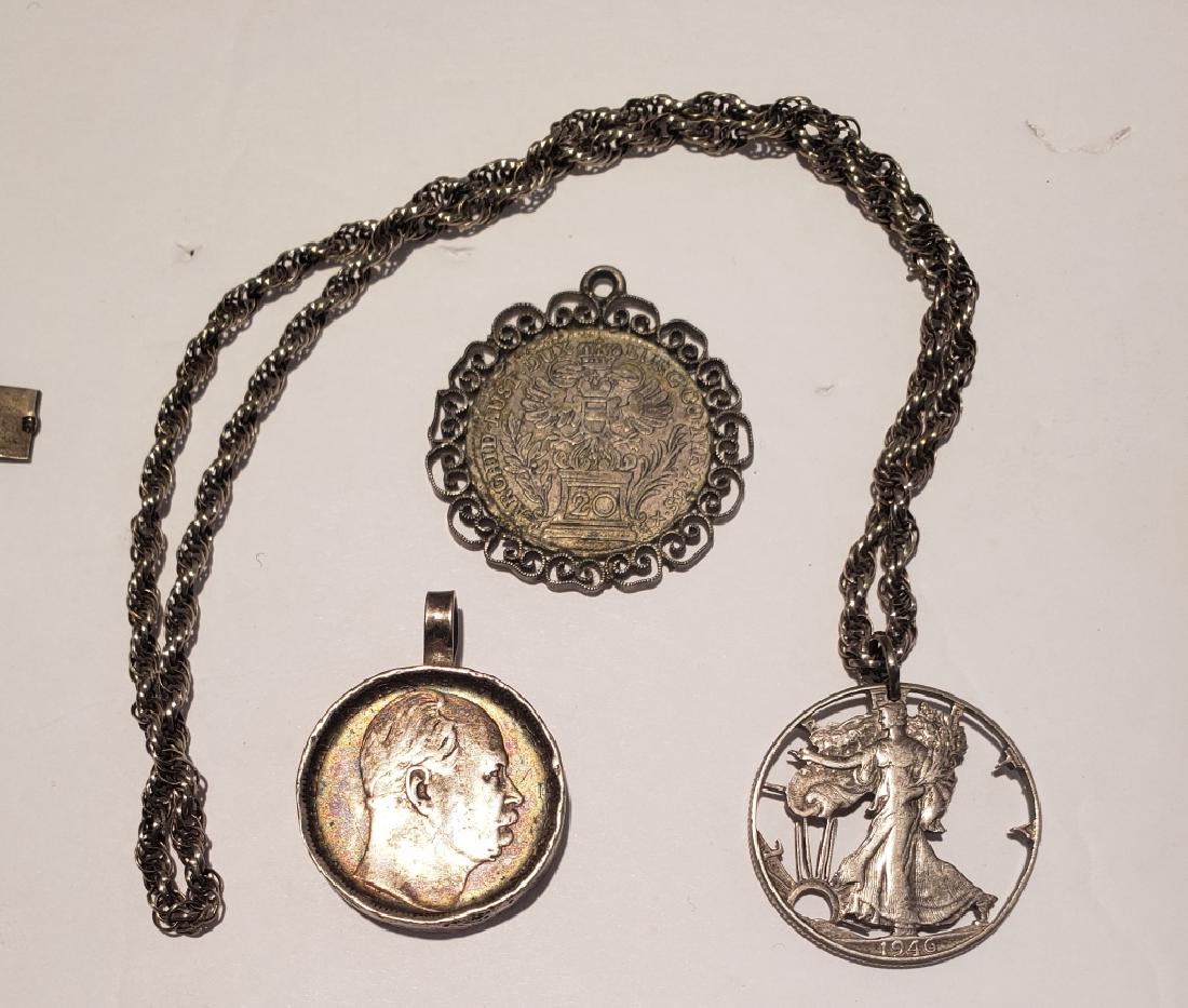 Antique Silver Coin Pendant Group (3): A German (?) coin with hammered edge, a cutout American half dollar, and an Austrian coin.