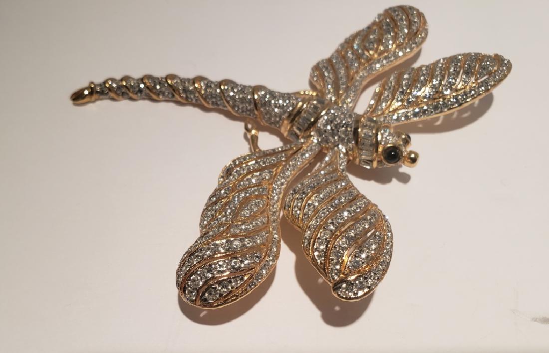 Large Vintage Ciner Dragonfly Pin 4.5": Large Ciner vintage dragonfly pin with rhinestones. 4.5" wide x 3 5/8" tall. Signed "Ciner".