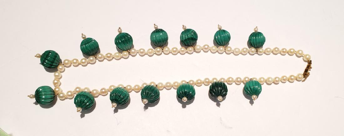 Malachite & Pearl 18" Necklace Gold Clasp: 14 Carved malachite beads (each .5") on a pearl necklace. Overall length is 18". With a nice quality 14K gold marked clasp.
