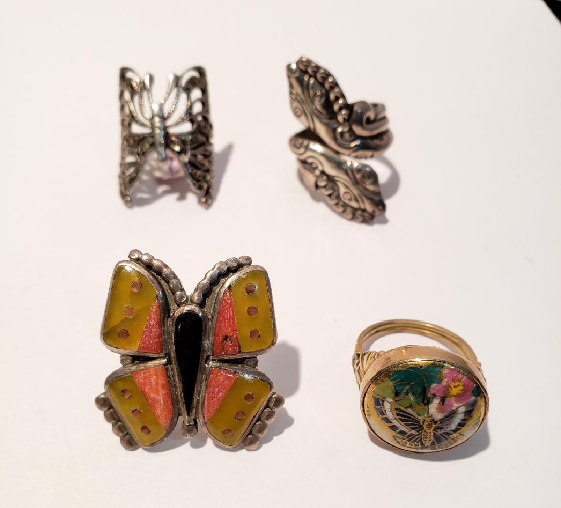 4 Sterling Butterfly Pins: largest 3.5" tall x 3 1/8" with inlaid semi precious stones "Sterling" and a cojoined JF (?) mark, unmarked, with turquoise eyes, unmarked, gold colored, with colorful enamel, and enameled with stones