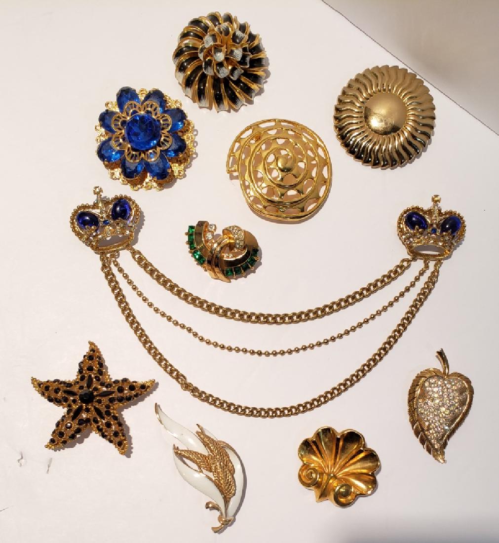 Vintage Group of Costume Pins 10 pcs: Florenza starfish, 2.5", Trifari leaf with white rhinestones, Boucher leaf with white enamel, Sedue shell pin, Monet gold tone sun, unmarked spiral shell, black & white flower, large pin with blue sto