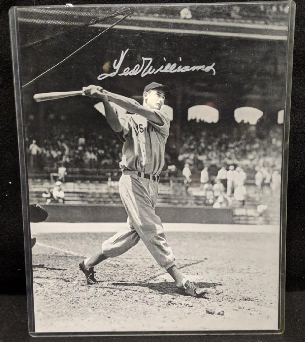 Boston Red Sox Ted Williams Autographed B/W Photo: A MLB Boston Red Sox Ted Williams autographed 11" X 14" photo / print. With COA from Stewart Zemsky Collectibles.