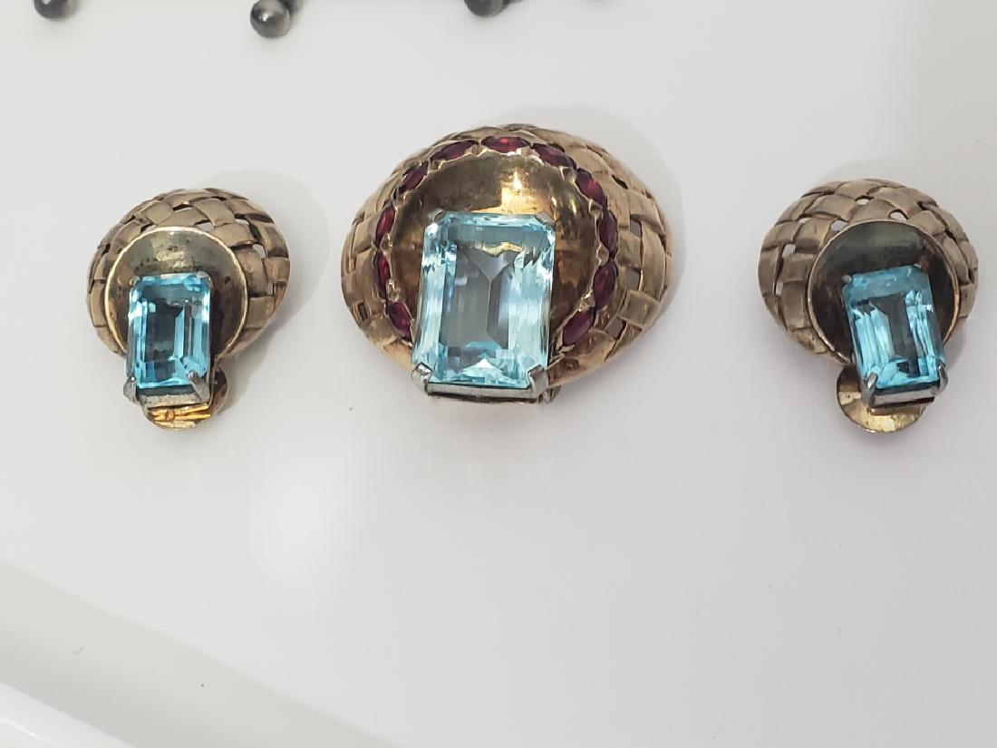 Mazer Sterling Silver Pin & Earrings Large Blue: Sterling silver pin1.5" tall x 1.5" wide, with large square blue "stone" at top, with a ring of red accent "stones". Signed on pinback "sterling", signed on back of pin "Sterling / Mazer". With matchi