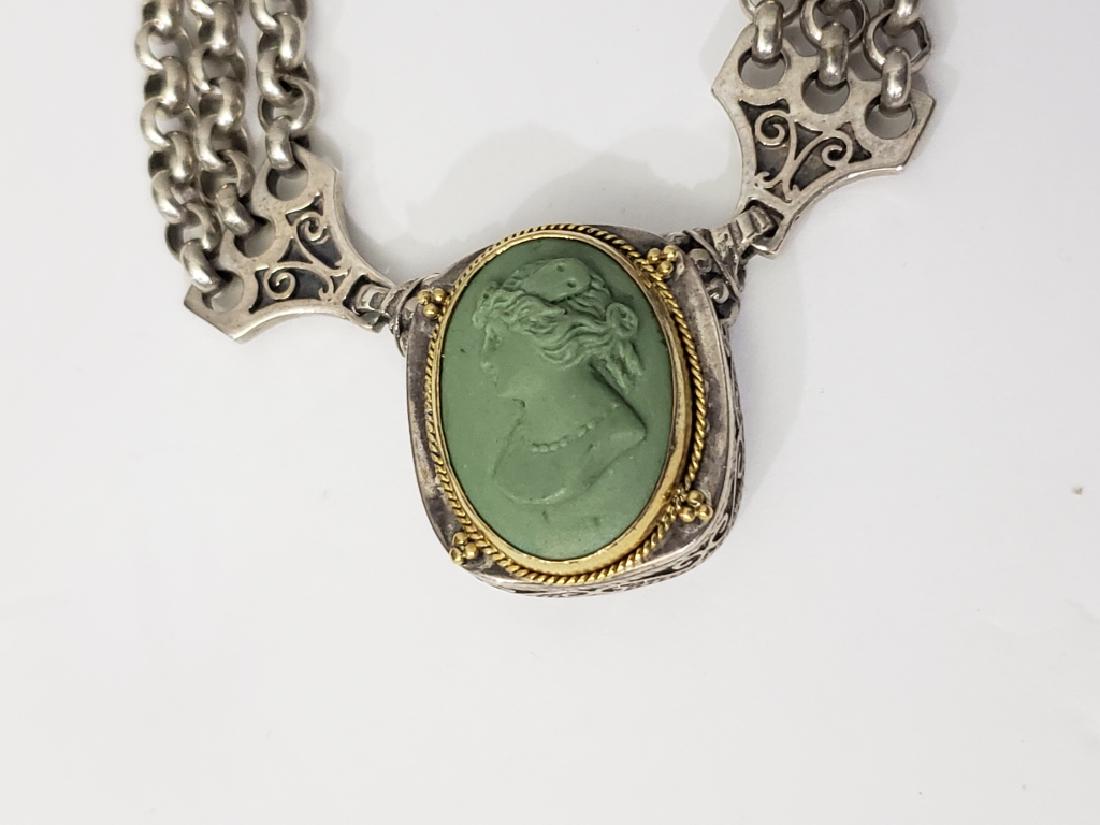 Sterling Silver, 22K Gold & Cameo Necklace: The neckalce roughly 16" overall, the cameo appx. 7/8" tall in green antique lava (?). Marked on the reverse "???/ .925/ 22K".