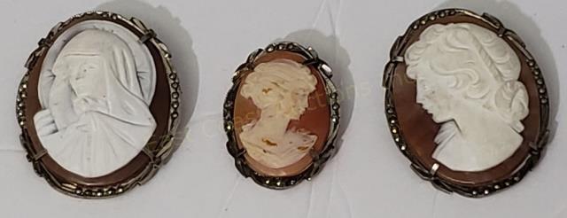 3 Vintage Cameos in Sterling / Marcasite Frames: 1) Female figure with halo (Virgin Mary?), 1.5", "Sterling", 2) Female figure looking left, 1.5" "Sterling", 3), Female looking right, 1 1/8", "sterling".