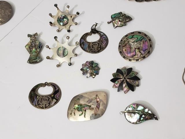 Group of 11 Silver & Abalone Inlaid Mexican Pins: Largest (bullfighter) 2.25". Total lot weight appx. 2.6 Oz. Troy.