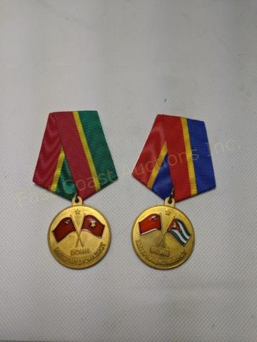 Soviet Russian Badges: Vietnam & Bay of Pigs: (2) Soviet Russian war participation badges with ribbons.