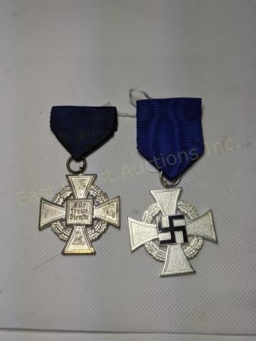 (2) 25 Year Nazi German Faithful Service Cross: Fur Treue Dienfte on the back of each.Both with blue ribbon and pin.