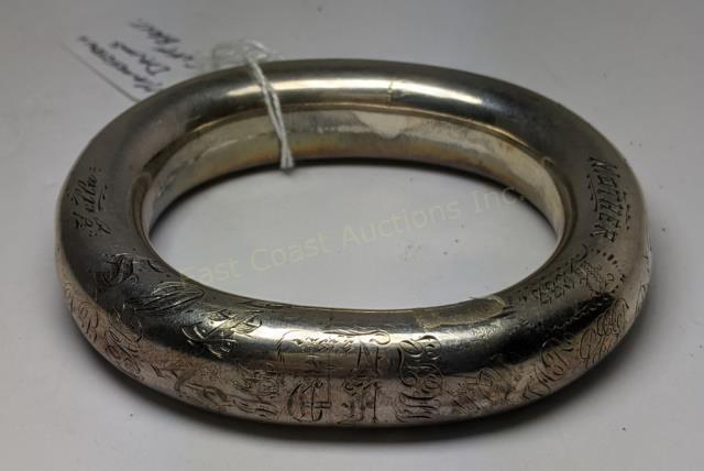 Antique Sterling Silver Hamilton & Davis Bracelet: The bracelet is appx. 3.75" x 3.25". Weighs 2.8 Oz. Troy. With "Mother" and perhaps 12-15 other sets of initials, names and other markings, presumably added over time. Marked "Sterling" and with the k