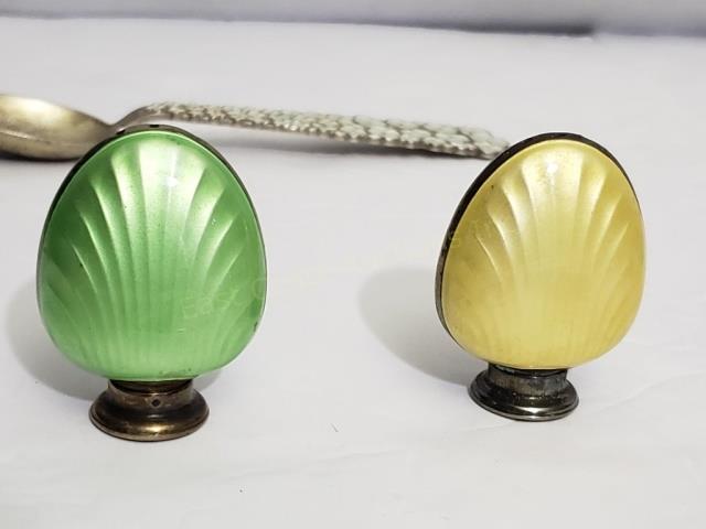 Two Enamel & Sterling Silver Salt / Pepper Shakers: One yellow, one green. 2 1/8" tall. Marked with a "T" in a shield, "925 S". No other marks. No defects to enamel, silver needs polishing. 1.63 Oz. Troy.
