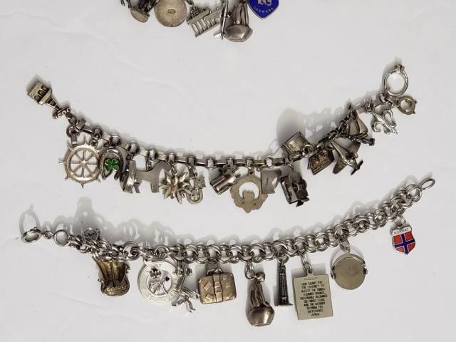 2 Vintage Sterling Silver Charm Bracelets: 1) 7.75", 10 charms, Mermaid on rock, suitcase, Lunar Lander, 1.61 Oz. Troy, 2) 18 charms, 7.5", biplane, airdale, drum, etc. 1.04 Oz. Troy.