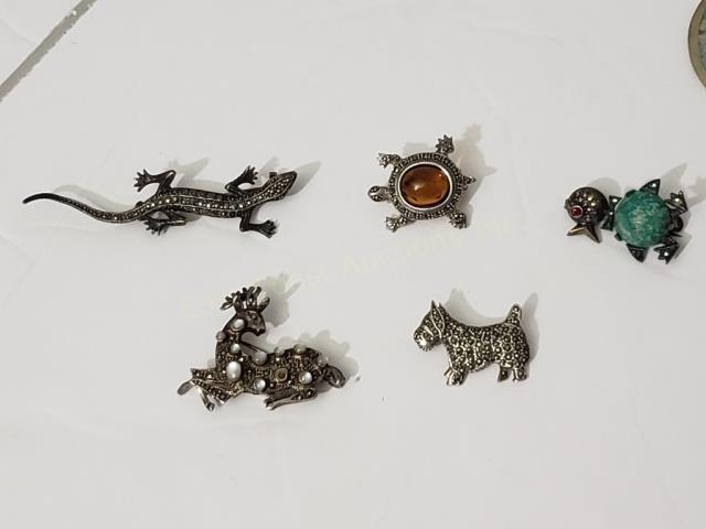 5 Sterling Silver & Marcasite Pins: 1) Small turtle with yellow "shell", 2) Lizard, 2.5", 3) Duck with blue stone body, 4) Scotty Dog, 5) Deer with small opalescent stones on body, one stone missing.