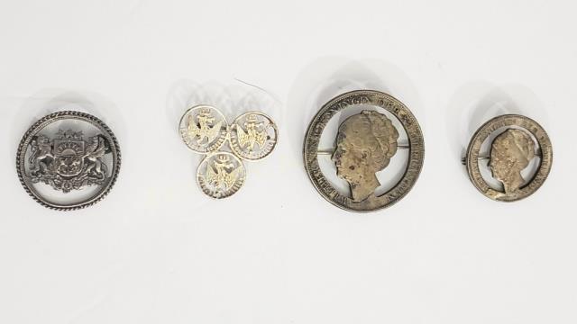 4 Antique Cut Out Coins Mounted As Pins: 1) Netherlands, 1932, 1.5", 2) Netherlands, 1931, 1", 3) Latavia, 1926, 1 1/8", 4) 3 small Mexican silver coins, soldered together, each 5/8", overall 1.5" x 1 1/8".