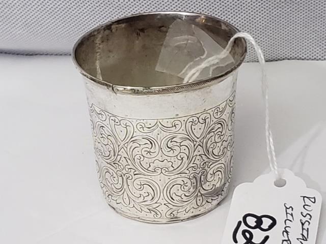 Russian Silver Engraved Cup: Russian Silver cup, 1.44 Oz. Troy. Marked ".84". Also marked on the base "84", other illegible marks. With intricate floral engraving.