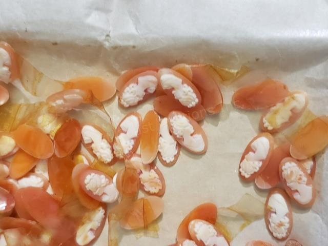 Huge Group of Unmounted Carved Cameos (150?): In Wolleman envelope "18/9 Oval", "Shell Cameo", hand written "150" (I'm guessing that is the count. Looks about right?). Each appx. 11/16".