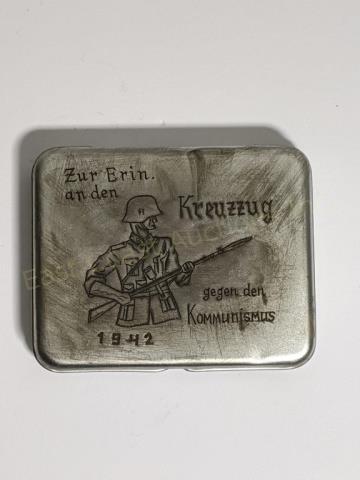 WWII German Third Reich Cigarette Case Inscribed: A WWII cigarette casewith inscribed image of a German Waffen SS Infantry Soldier. With words from top left to bottom: "Zur Erin an den" "Kreuzzug" 1942 "gegen den Kommunismus"