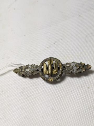 WWII German Third Reich Luftwaffe Bomber Clasp: Luftwaffe flying clasp issued to aircrew of Luftwaffe bombers in recognition of their number of operations flown. This clasp is silver, indicating 20 flown missions. 3" X 1"