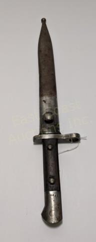 German Bayonet WW2 With Scabbard: Wood handle bayonet, appx. 15 7/8" overall. 14.75" without scabbard. Numbered near wooden handle portion, "14808" (a little hard to read). No other marks.