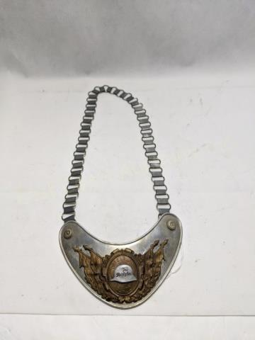 Geramn WW2 Gorget Der Stahlhelm Ortsgruppe Glatz: Gorget 6.25" wide x 4.24" tall. Legend on front "Der Stahlhelm" on helmet, "Ortsgruppe Glatz" on copper background. Green (replaced?) felt on reverse. One hook on reverse "R.Z.M. / M34/2".