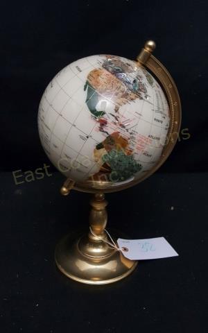 **An Inlaid Decorative Stone Globe: On brass stand. 16.5" tall overall, globe appx. 8" diameter.